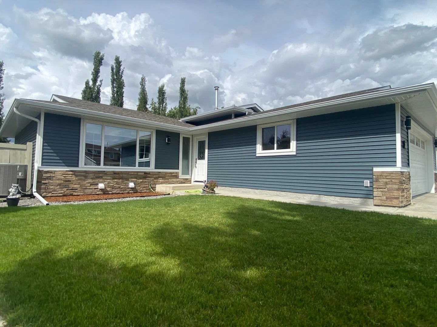 Renovating with Midnight Surf Siding — Blue Jay Exterior Renovations